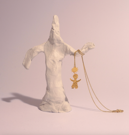 Apres Ski Figurine Gold Pendant